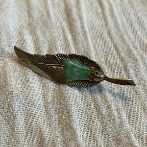 Feather brooch